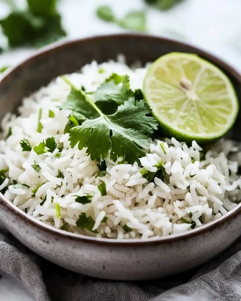 Bowl of Cilantro Lime Rice made in Instant Pot with fresh cilantro and lime